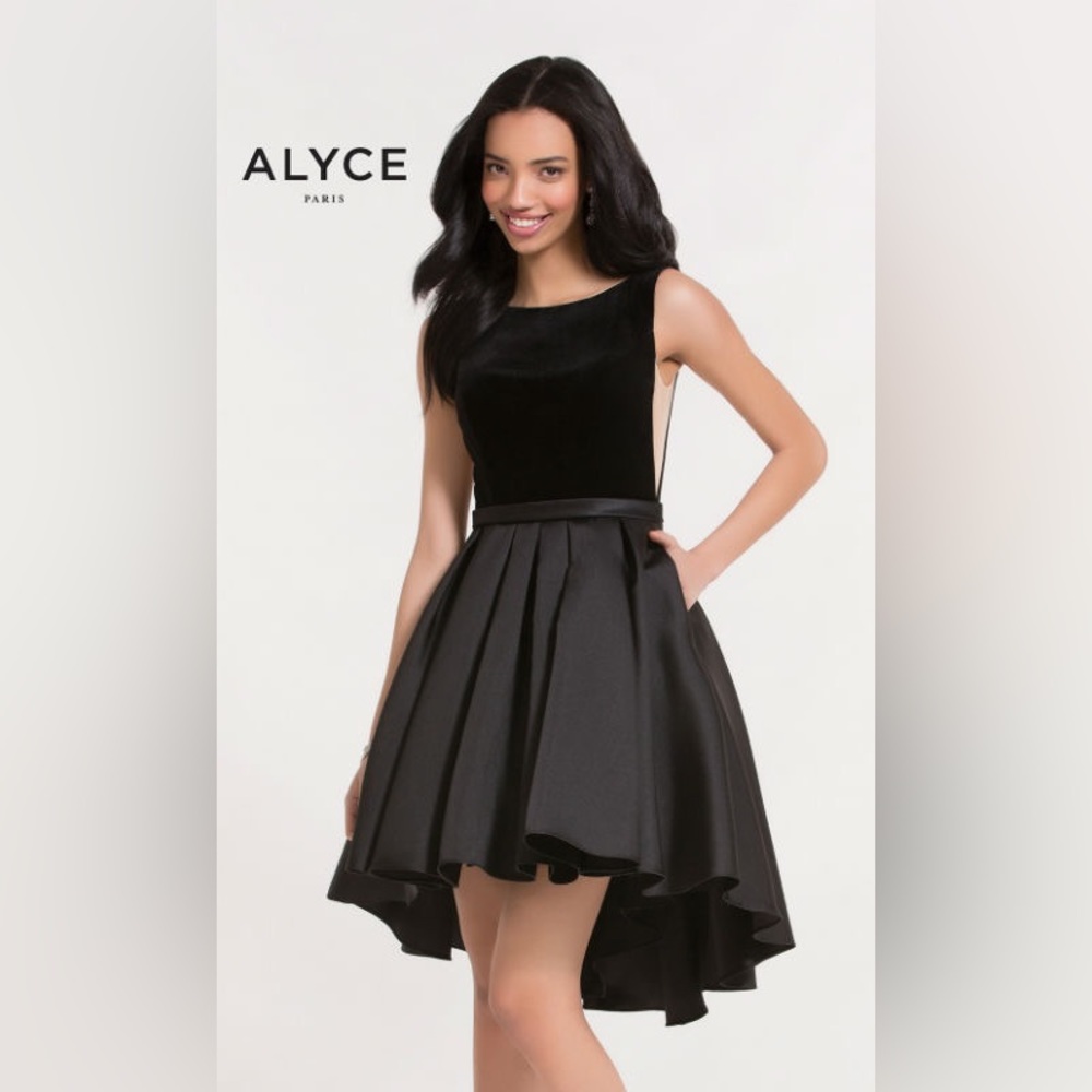 Size 2. black and white color. pockets. high low dress. low back